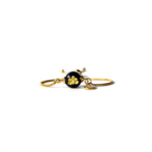 Pulsera Florece negro/dorada